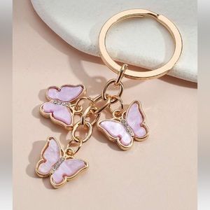 NIP PINK BUTTERFLIES BAG CHARM